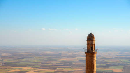 The minaret of Great Mosque and the plain of Mesopotamia,Mardin,Turkeyの写真素材