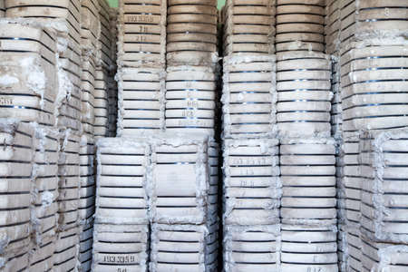 Raw cotton bales in textile factory.の写真素材