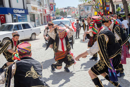 Manisa,Turkey - Manisa,Turkey - 04-24-2016:Dance group (efe) show on the street in Manisa Kula districtのeditorial素材