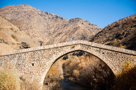 Semdinli,HakkariTurkey - 11-18-2010:Historical stone bridge in Semdinli district.The bridge was built in 1898 by Sheikh Muhammed SÄ±ddÄ±k.のeditorial素材