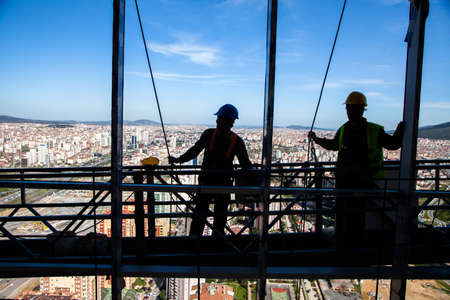 Istanbul,Turkey - 04-02-2013:Construction workers in Istanbul work safely in a multi-storey buildingのeditorial素材
