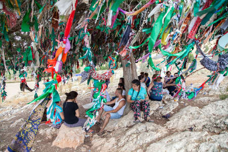 Elmali,Antalya,Turkey - 06-25-2016:A multicolored traditional wish tree in the village of Tekkeのeditorial素材