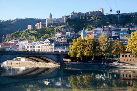 Tbilisi,Georgia - 11-03-2016:Ancient Narikala fortress, Sioni Cathedral, Metekhi stone Bridge over...