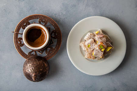Traditional pistachio Turkish delight and Turkish coffee, top viewの写真素材