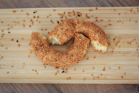 Sesame bagesl. Bagels with wooden background. Turkish bagels. Traditional sesame turkish bagel....