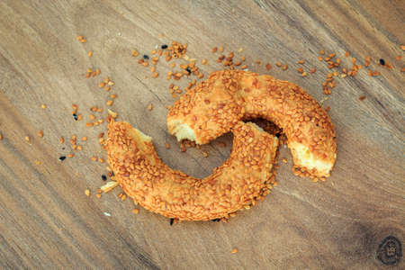 Sesame bagesl. Bagels with wooden background. Turkish bagels. Traditional sesame turkish bagel. Ramadan background. High quality photoの写真素材