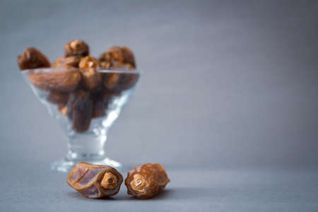 Ramadan background. Islamic culture and Ramadan. Dried apricots, dried figs and dates photo. High...