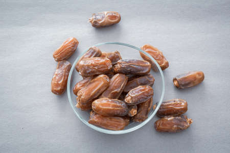 Ramadan background. Islamic culture and Ramadan. Dried apricots, dried figs and dates photo. High...