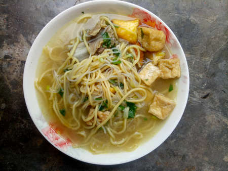 Sweet potato soup noodles served on a white plate. Indonesian special foodの写真素材
