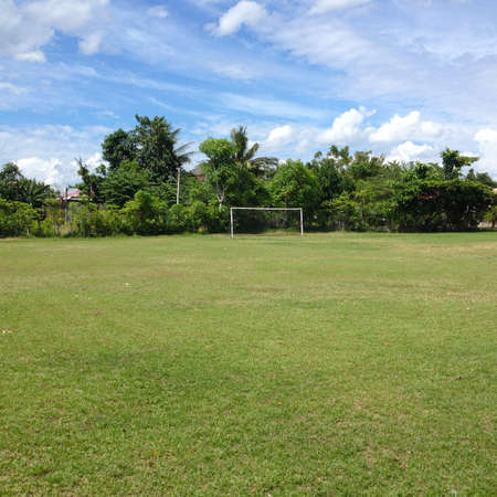 Soccer field with cloudy in the countryside.の写真素材