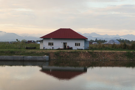wooden house on the shore of Lake Limboto, Gorontalo-Indonesiaの写真素材