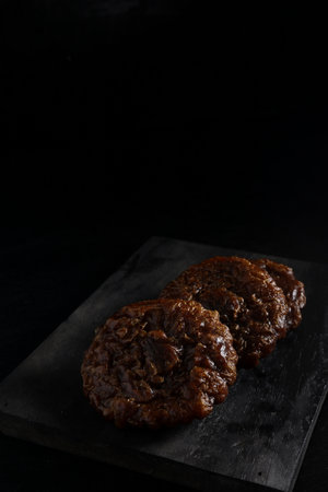 cucur cake isolated on black background. Indonesian cakeの写真素材