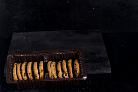 Chocolate chip cookies on black backgroundの写真素材