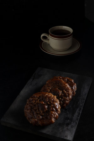cucur cake and tea isolated on black background. Indonesian cakeの写真素材