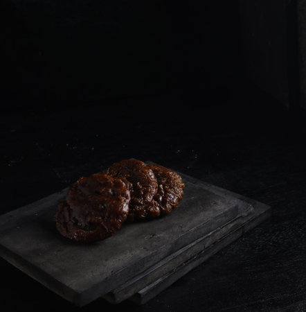 cucur cake isolated on black background. Indonesian cakeの写真素材