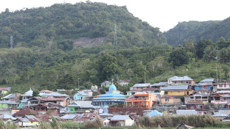 Landscape of a residential area at the hill with some tree and nature blend
