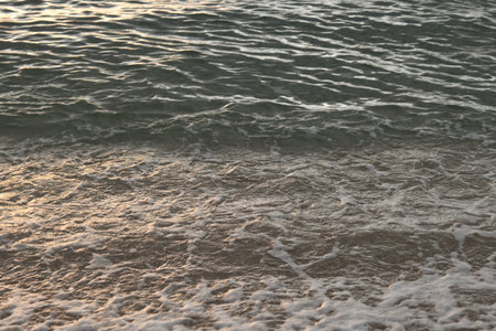 beautiful sandy beach and soft blue ocean wave