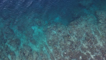aerial view of coral reef with blue seaの写真素材