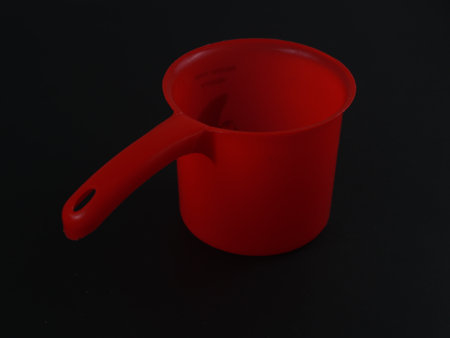 plastic bailer isolated isolated on black backgroundの写真素材