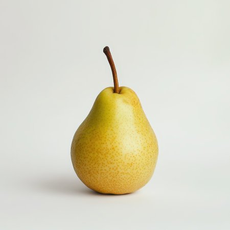 Ripe yellow pear on a white background. Isolate. Copy space.の素材
