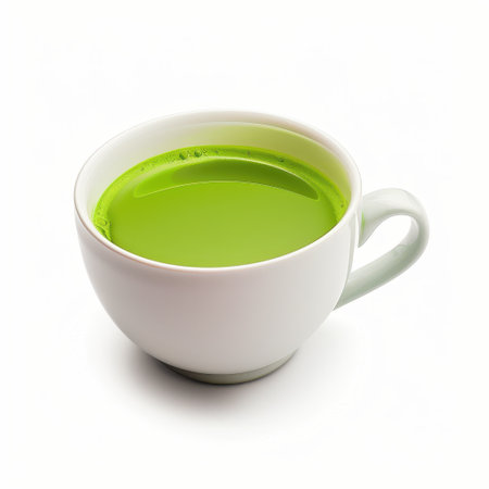 A cup of hot matcha tea isolated on a white background.の写真素材
