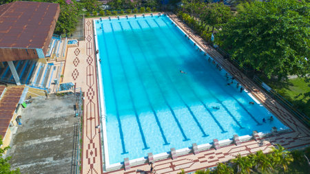 Top view of swimming pool with blue water