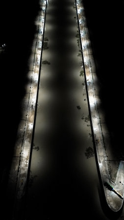 Railway tracks in the city at night. View from above.