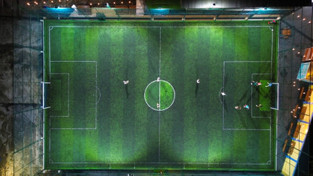 Soccer field with green grass. Football field top view. Aerial view.