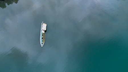 Aerial View of Boat on Calm Waterの写真素材