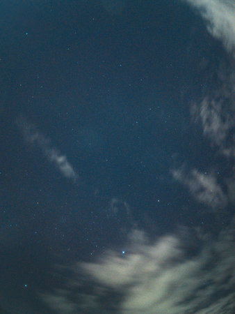 Starry Night Sky with Cloudsの写真素材