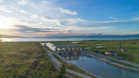 Aerial View of Water Control Structure at Sunsetの写真素材