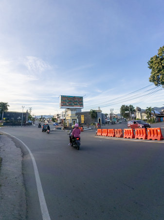 Motorcycles at City Street Intersection