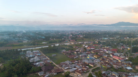 Aerial View of Rural Town with Mountainsの写真素材