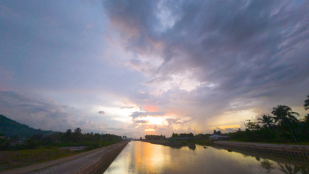 Scenic View of Canal at Sunsetの写真素材