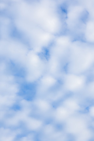 Fluffy White Clouds in a Blue Sky