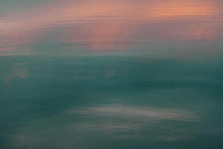 Sunset reflection on water surface