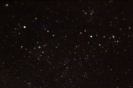 Glittering Sparkling Lights on Dark Background