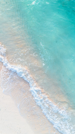 Aerial View of Beach Shoreline with Turquoise Water