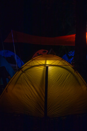 Illuminated Tent at Night in Campsite