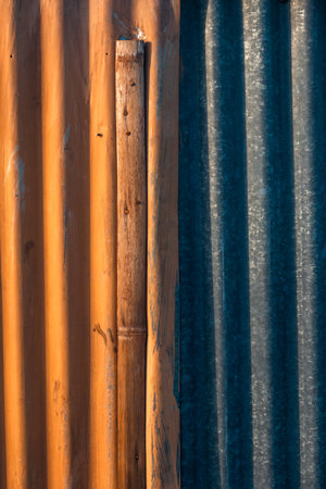 rusty corrugated iron sheet background, closeup of photoの写真素材