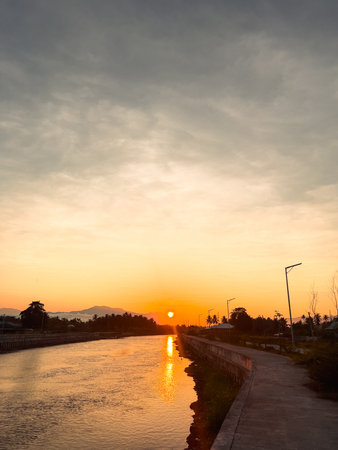 Sunset Over Water Canal Sceneryの写真素材