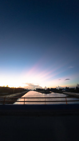 Scenic River View at Sunsetの写真素材