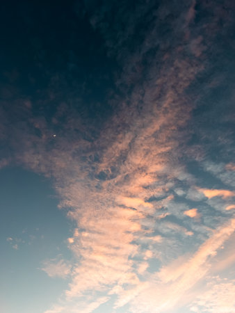 Dreamy Sky with Clouds at Sunsetの写真素材