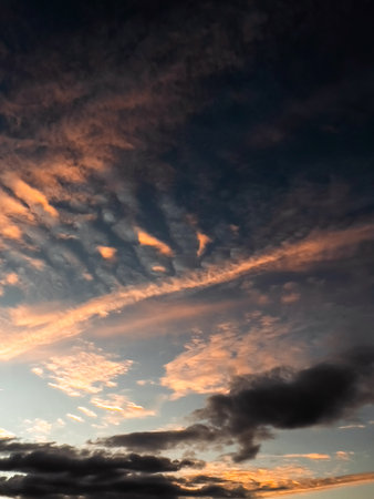 Cloudscape, Colored Clouds at Sunset near the Ocean on a Cloudy Day