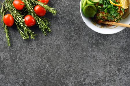 vegetables and salad on gray stone backgroundの写真素材