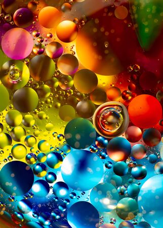 many multi-colored round oil droplets, macro, bright bubblesの写真素材