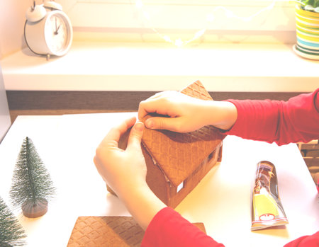 How to assemble a gingerbread house, step by step instructions. Home leisure.の写真素材