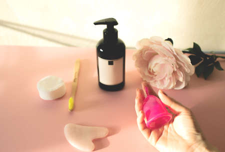 Menstrual cup in a woman's hand.