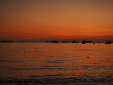 sunset sea boatの写真素材