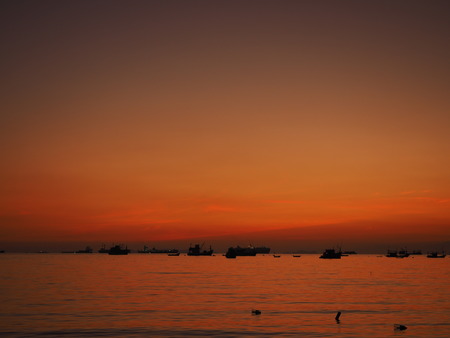 sunset sea boatの写真素材
